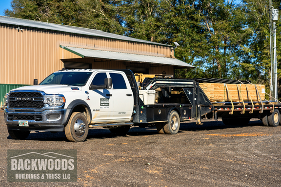 Backwoods Buildings delivery truck loaded with DIY pole barn kit ready for nationwide shipping