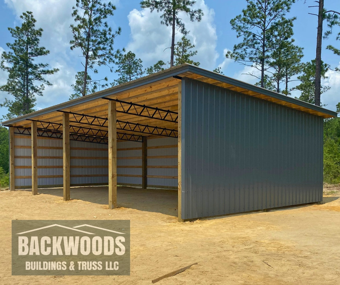 Enclosed single slope barn kit installed Defuniak Springs, Florida